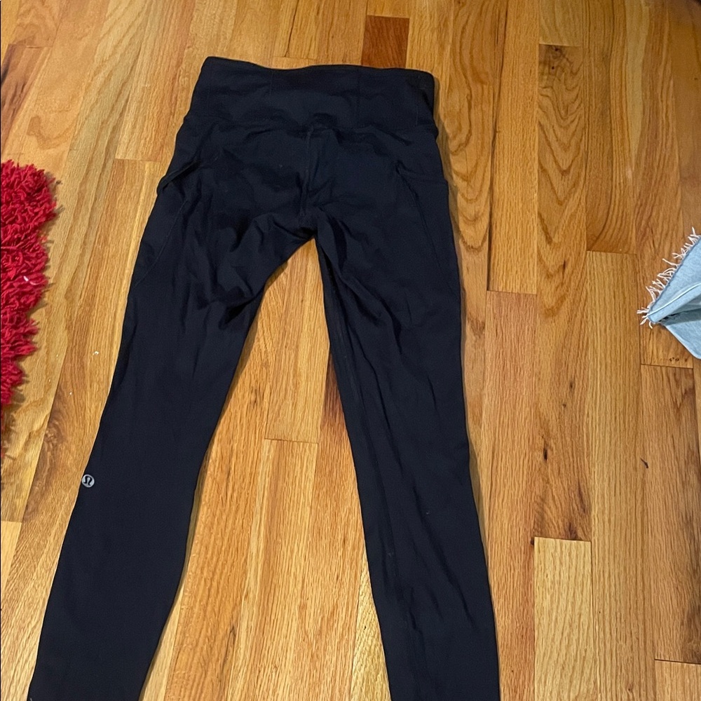 lululemon athletica Black Leggings size 4 w reflective dots barely worn